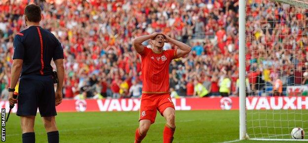 Wales substitute Simon Church reacts after having a 'goal' disallowed for offside