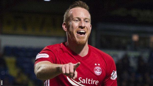 Adam Rooney celebrates a goal for Aberdeen