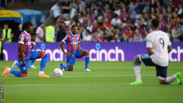 Players take the knee in the Premier League