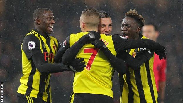 Watford players celebrate Jose Holebas's goal