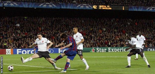 Lionel Messi scores his fourth goal against Arsenal