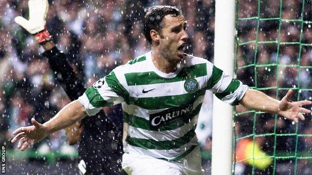 Scott McDonald celebrates his winning goal against AC Milan