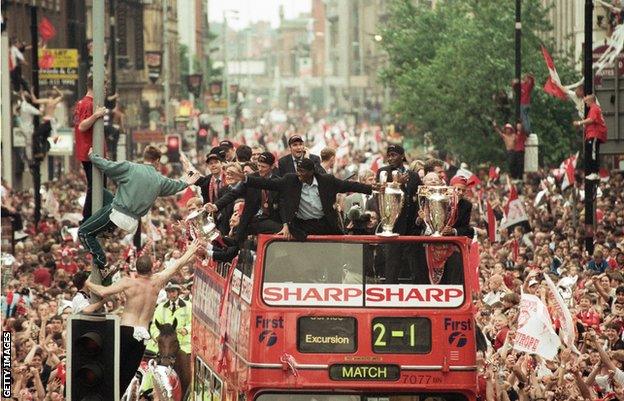 Manchester United celebrate their Treble win of 1999