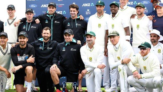 New Zealand and South Africa players with the Test series trophy