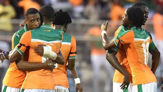 Ivory Coast players celebrate after qualifying for January's Nations Cup.