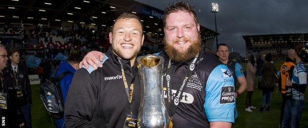 Ryan Grant and Jon Welsh celebrate with the Pro12 trophy