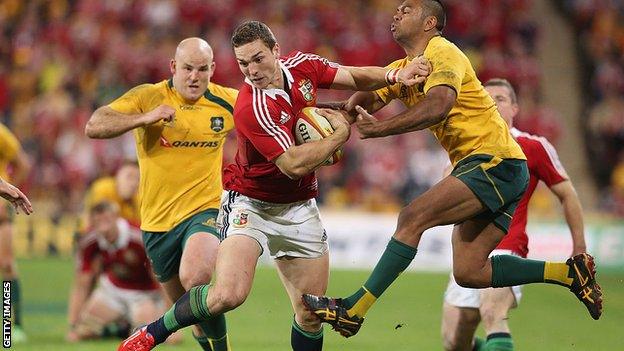 George North evades Kurtley Beale