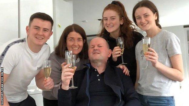 Sean Cox and his family celebrates his return home after two years of hospital treatment