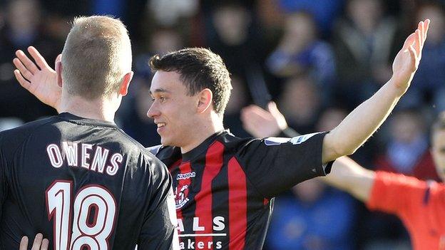 Paul Heatley celebrates after putting Crusaders ahead against Glenavon