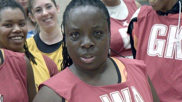 Nisha (centre) and members of the Bran Nu netball club from Birmingham