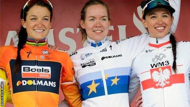 Deignan (left) celebrates on the podium with Van Der Breggen (centre)