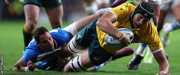 Adam Coleman scores a try for Australia against Argentina