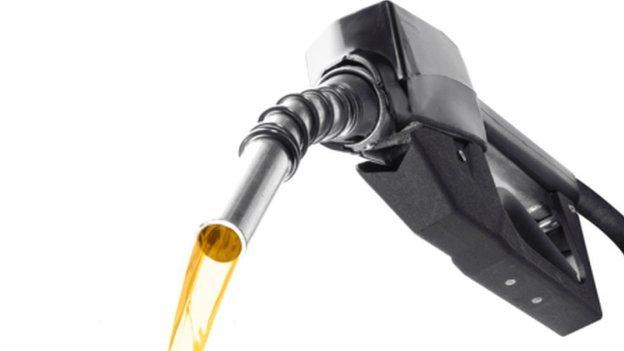 Petrol pump dispensing liquid gold