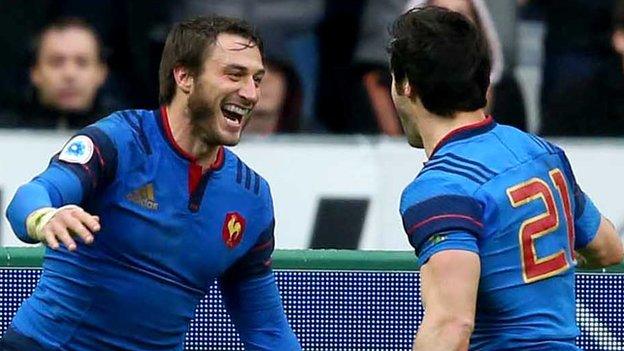 Maxime Medard celebrates with Jean-Marc Doussain after his match-winning try in Paris