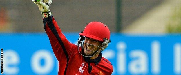 Jersey captain Pete Gough celebrates hitting the winning runs