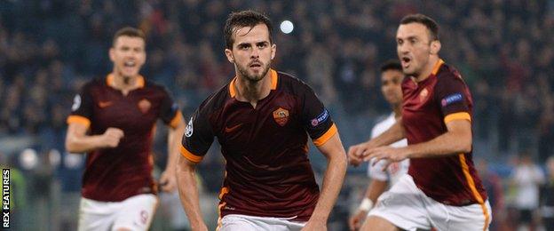 Miralem Pjanic celebrates after scoring against Bayer Leverkusen