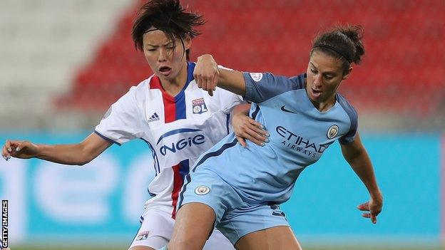 Carli Lloyd of Manchester City battles with Saki Kumagai of Lyon