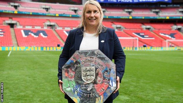 Emma Hayes with the Community Shield trophy