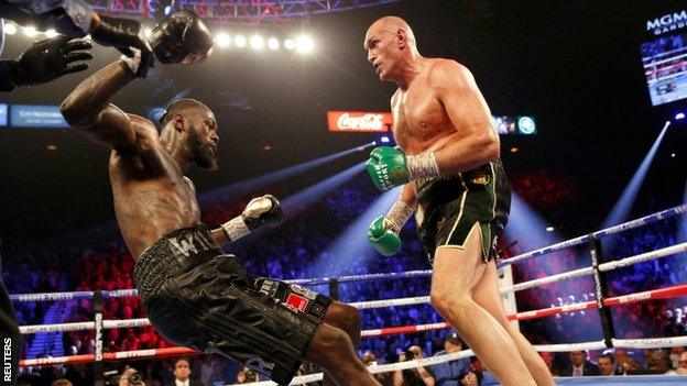 Deontay Wilder is knocked down during his second fight with Tyson Fury