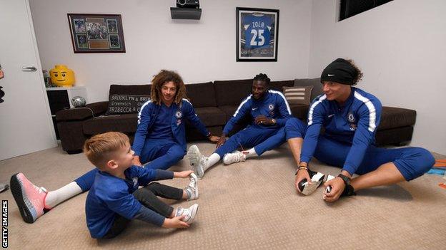 Hudson McCarthy with Chelsea's David Luiz, Tiemoue Bakayoko and Ethan Ampadu