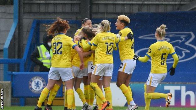 Brighton players celebrate