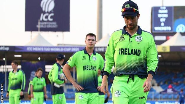 A dejected Andrew Balbirnie leads the Ireland players off the pitch after the T20 World Cup defeat by Namibia last year