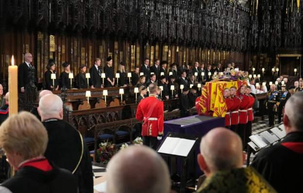 Queen Elizabeth II's coffin is carried into St George's Chapel in Windsor Castle, Berkshire