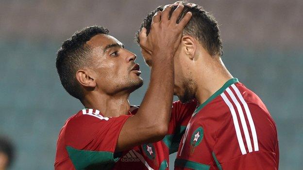 Morocco striker Abdessalam Ben Jelloun (right) is congratulated after scoring a goal against Libya