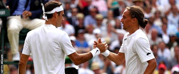 Roger Federer and Alexandr Dolgopolov