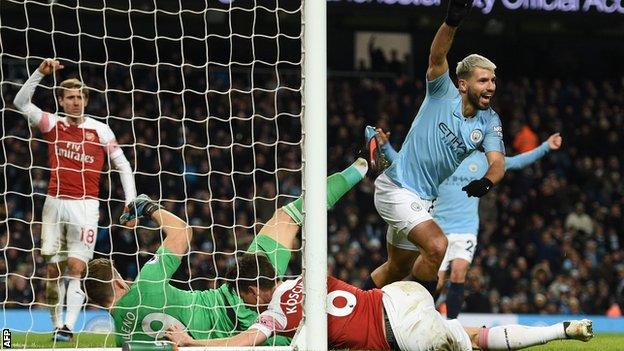 Sergio Aguero celebrates scoring for Manchester City against Arsenal