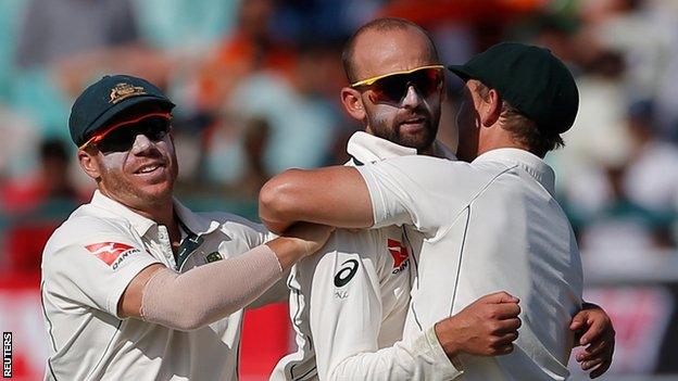 Australia spinner Nathan Lyon (centre)