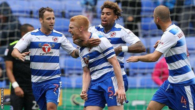 Paul McShane celebrates his goal with his Reading team mates