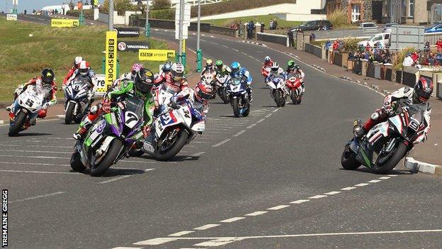 Riders approach York Corner on the Triangle Circuit at the North West 200