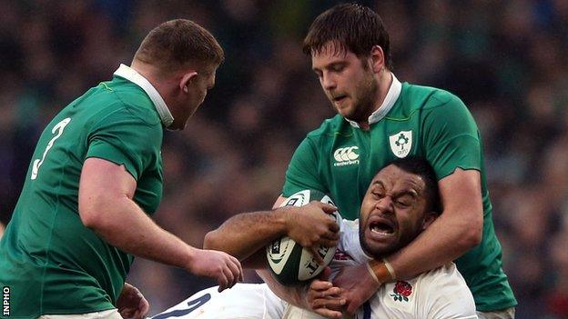 Iain Henderson tackles Billy Vunipola at the Aviva Stadium