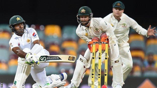 Asad Shafiq (left) in action against Australia