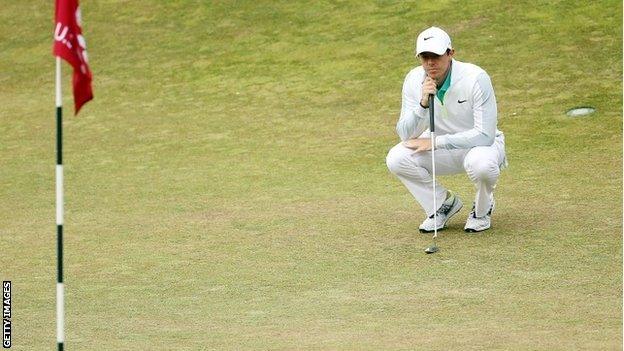 Rory McIlroy surveys the 12th green