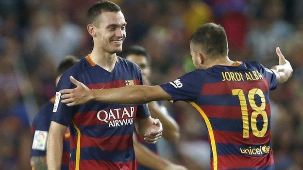 Thomas Vermaelen celebrates his winning goal with Jordi Alba