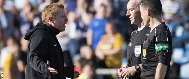 Hibs head coach Neil Lennon remonstrates with referee Bobby Madden at Cappielow