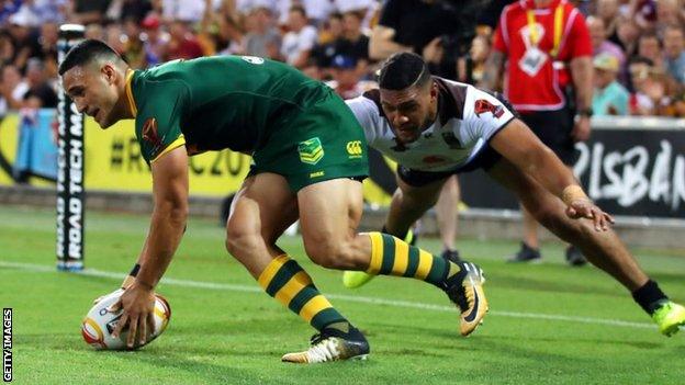 Valentine Holmes touching down to score another try