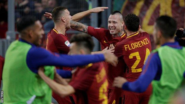 Roma celebrate defeating Lazio