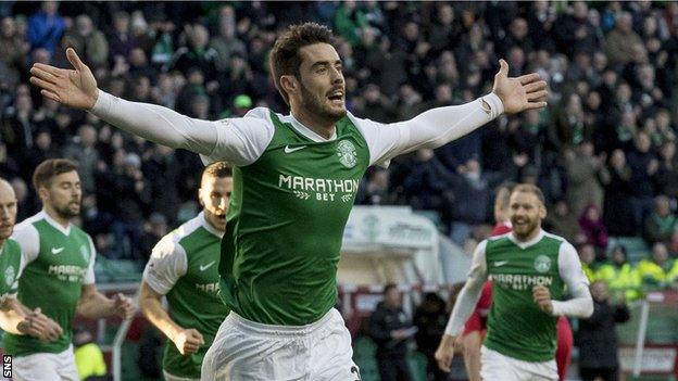 Brian Graham celebrates a goal for Hibs in a 4-0 win over Queen of the South