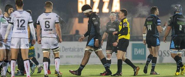 Brian Alainu'uese (centre) is sent off by George Clancy