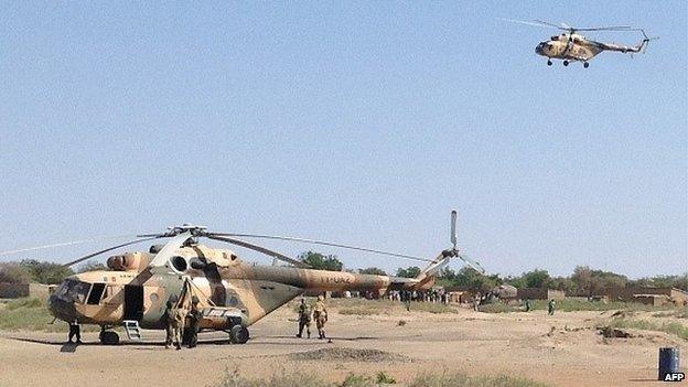 Mi-8 attack helicopters are seen in Fotokol, Cameroon, on February 1, 2015, after an operation in nearby Gamboru, Nigeria