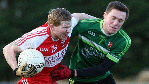 Derry's Enda Lynn battles with QUB's Niall Delargy in last season's McKenna Cup match