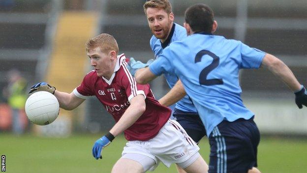 Slaughtneill forward Christopher Bradley moves clear of two Killyclogher opponents in the semi-final