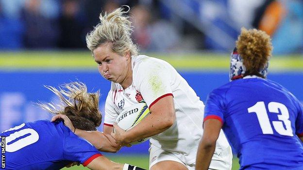 Marlie Packer pushes back a France player