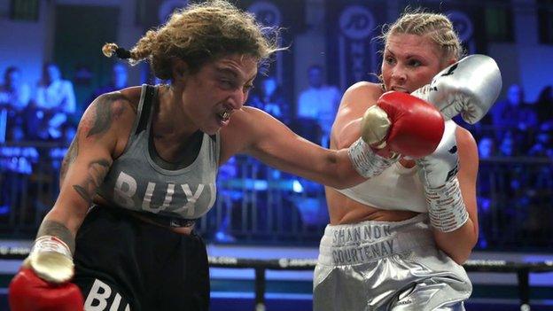 British bantamweight Shannon Courtenay punches Buchra el Quaissi during the bantamweight contest against Buchra El Quaissi at York Hall on December 19, 2019 in London.