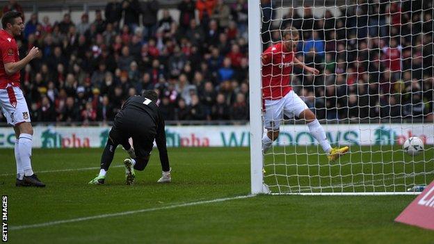 Sam Dalby gives Wrexham a 10th minute lead against Oldham