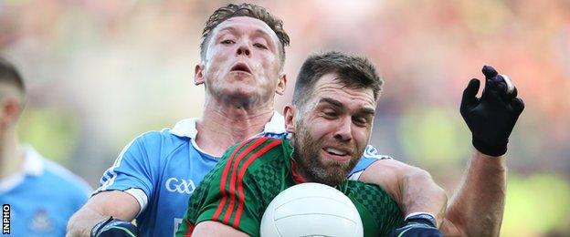 Dublin's Paul Flynn battles with Mayo's Seamus O'Shea