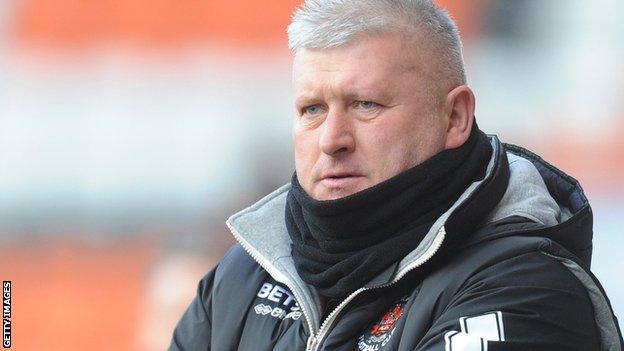 Blackpool manager Terry McPhillips watches on